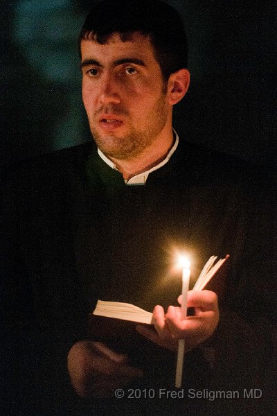 20100410_105655 D300.jpg - Choir member, in candlelight, Church of the Holy Sepulchre